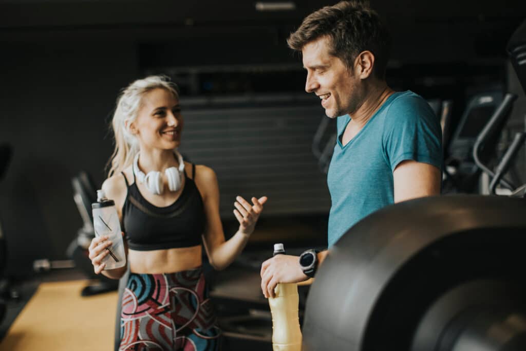 healthy couple drinking water - Intermittent Fasting Health Benefits