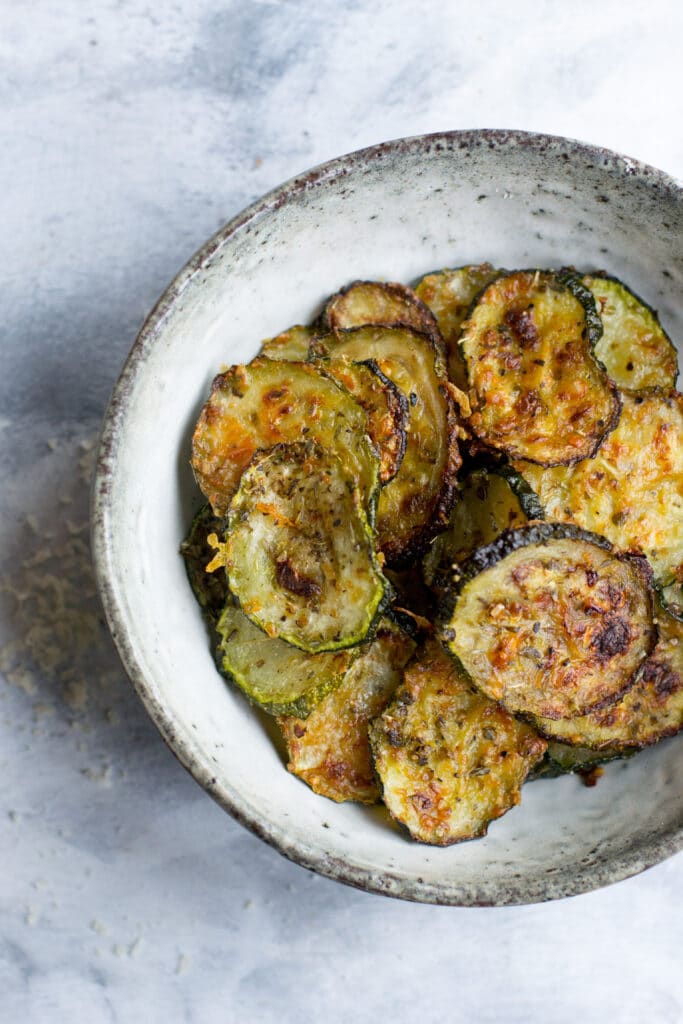 Baked keto courgette chips in a bowl