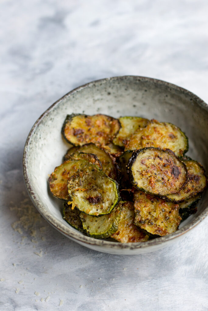 Baked keto courgette chips in a bowl