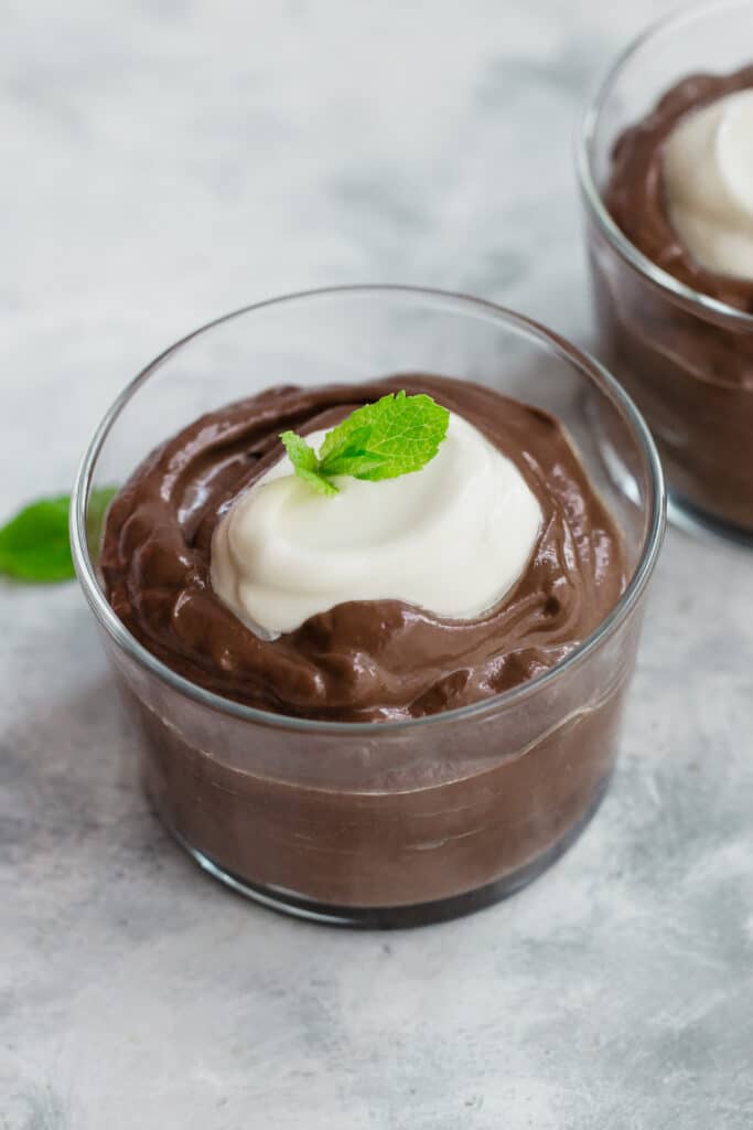 Keto chocolate avocado mousse with cream cheese frosting