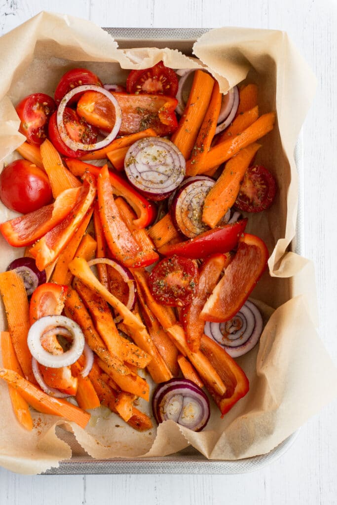 Raw vegetables in a baking tray