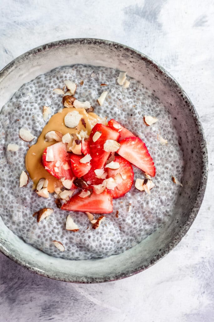 Vegan keto chia seed pudding with strawberries on top