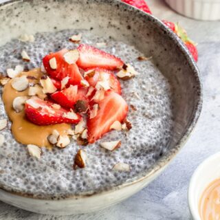 Vegan keto chia seed pudding with strawberries on top