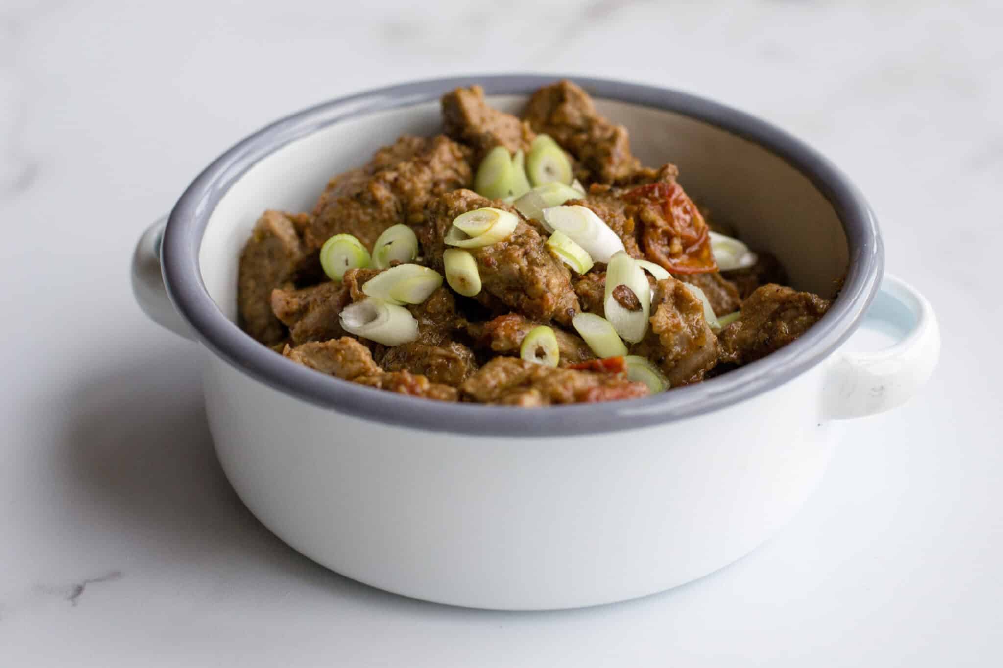 Keto diced beef in a small container