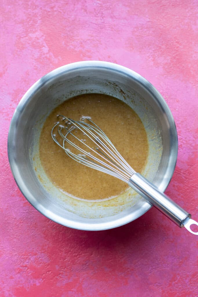 Ingredients for peanut butter cookies in a bowl