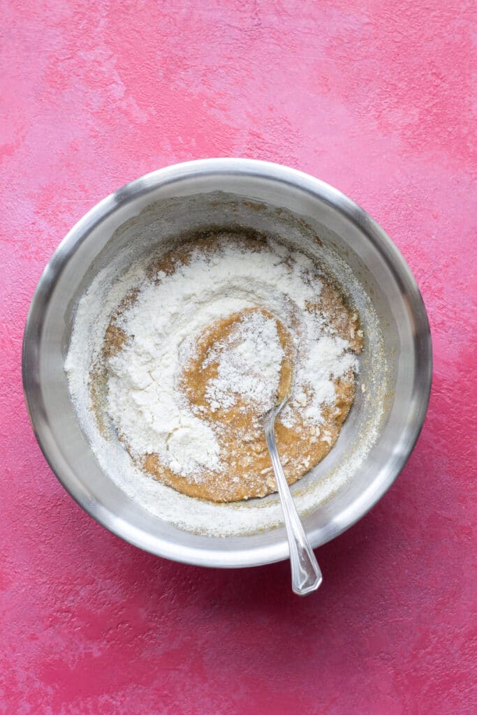 Ingredients for peanut butter cookies in a bowl