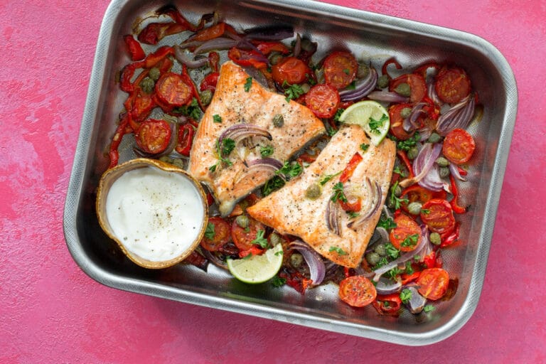 Salmon and vegetables cooked in a baking tray