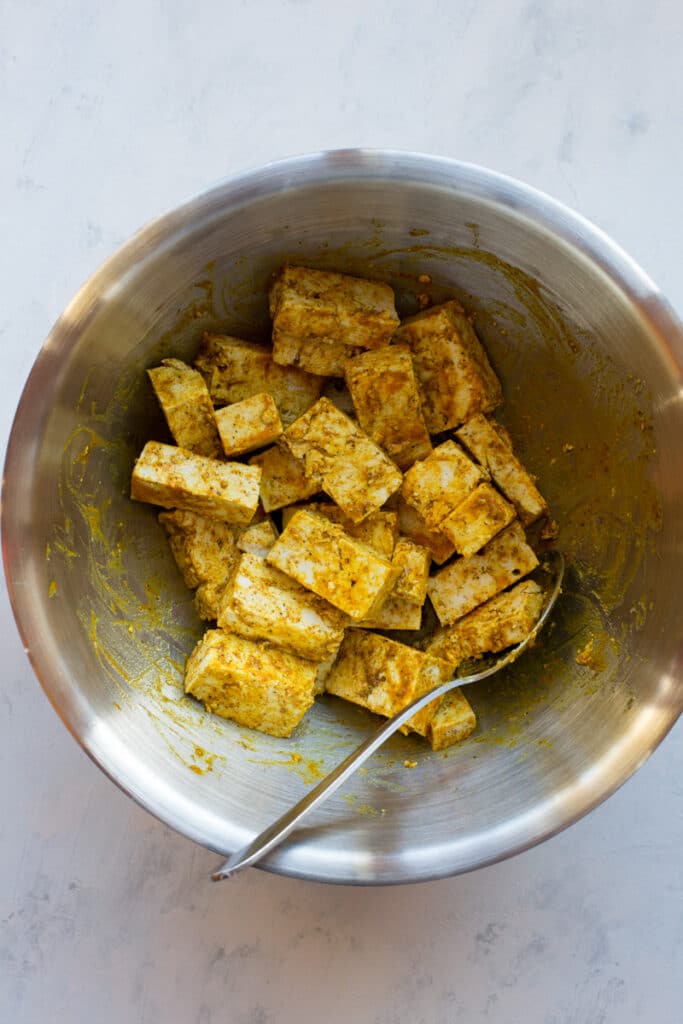 Curries tofu in a bowl
