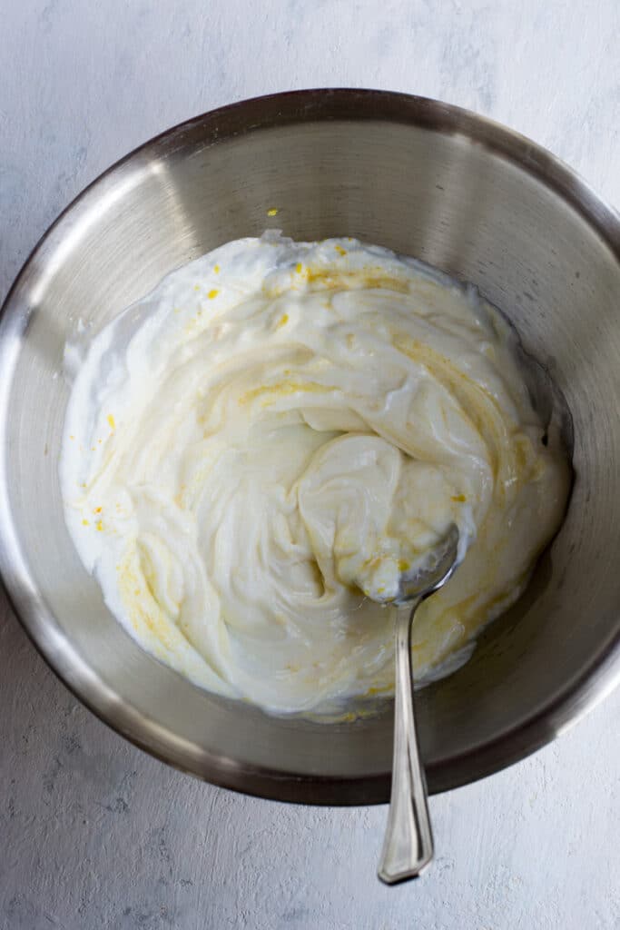 Ingredients for lemon mousse in a bowl