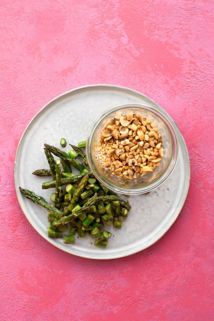 Cooked asparagus and nut granola