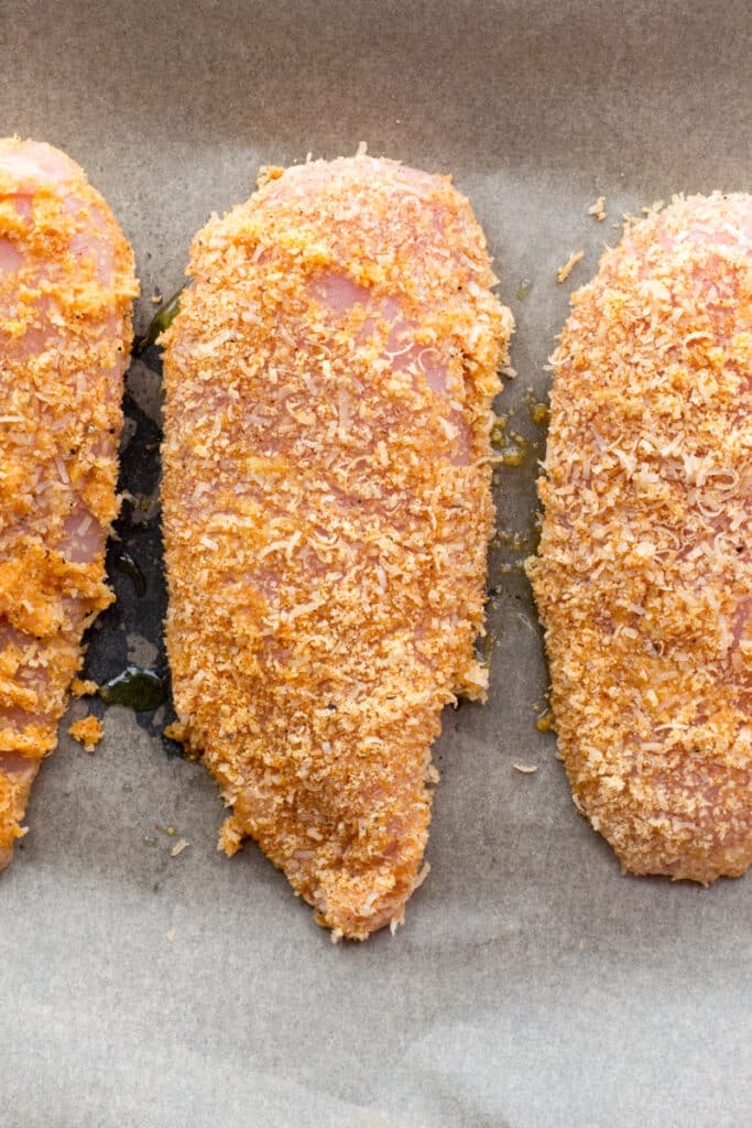 Coated raw chicken